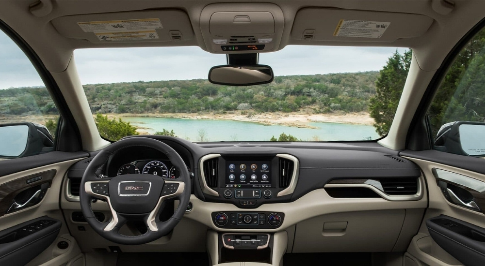Tan and black dash in a  2024 GMC Terrain Denali