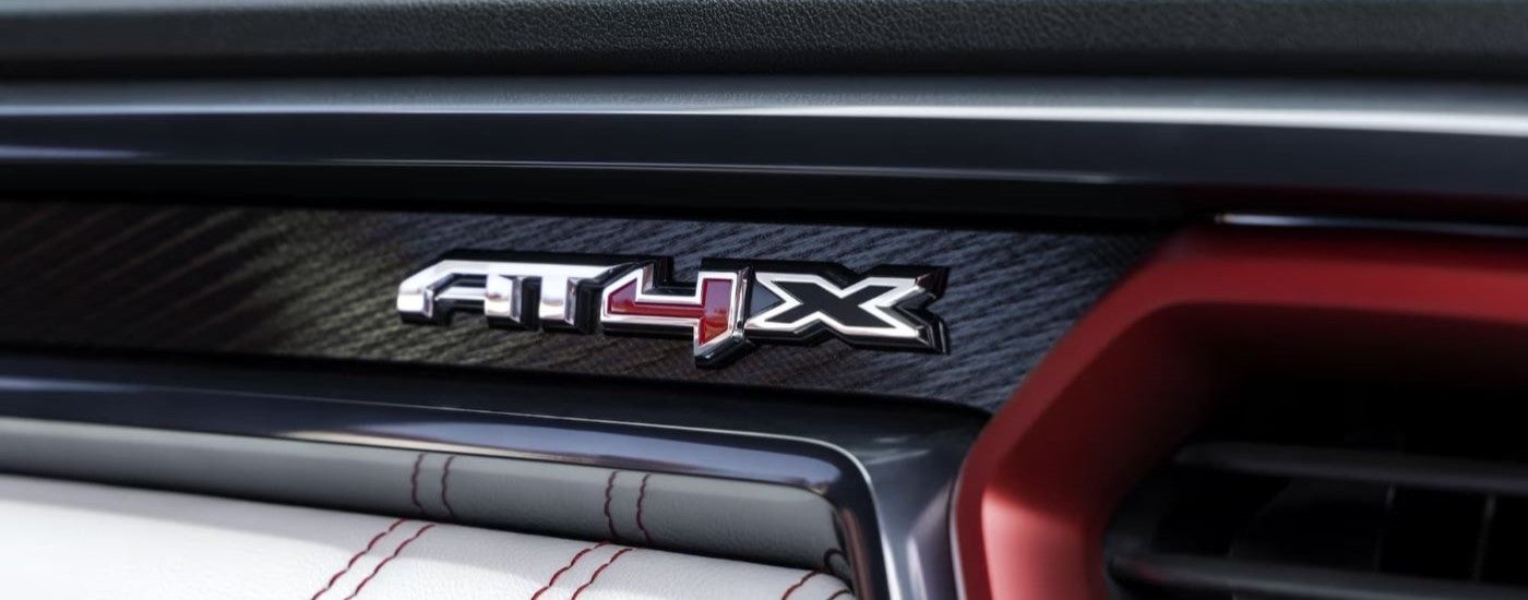 Badge on the dash of a 2023 GMC Canyon AT4X