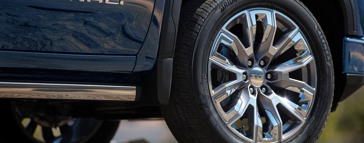 Side and wheel on a blue 2025 GMC Sierra 1500 for sale near Madisonville